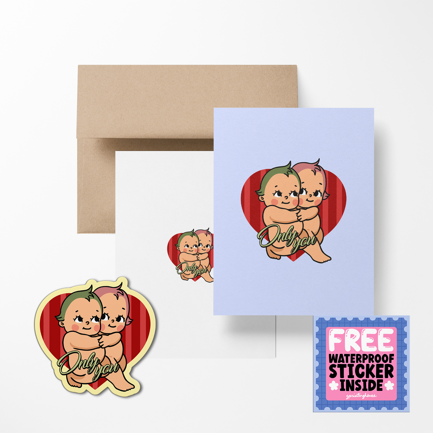 Card with cartoon babies design, envelope, and free sticker on a white background