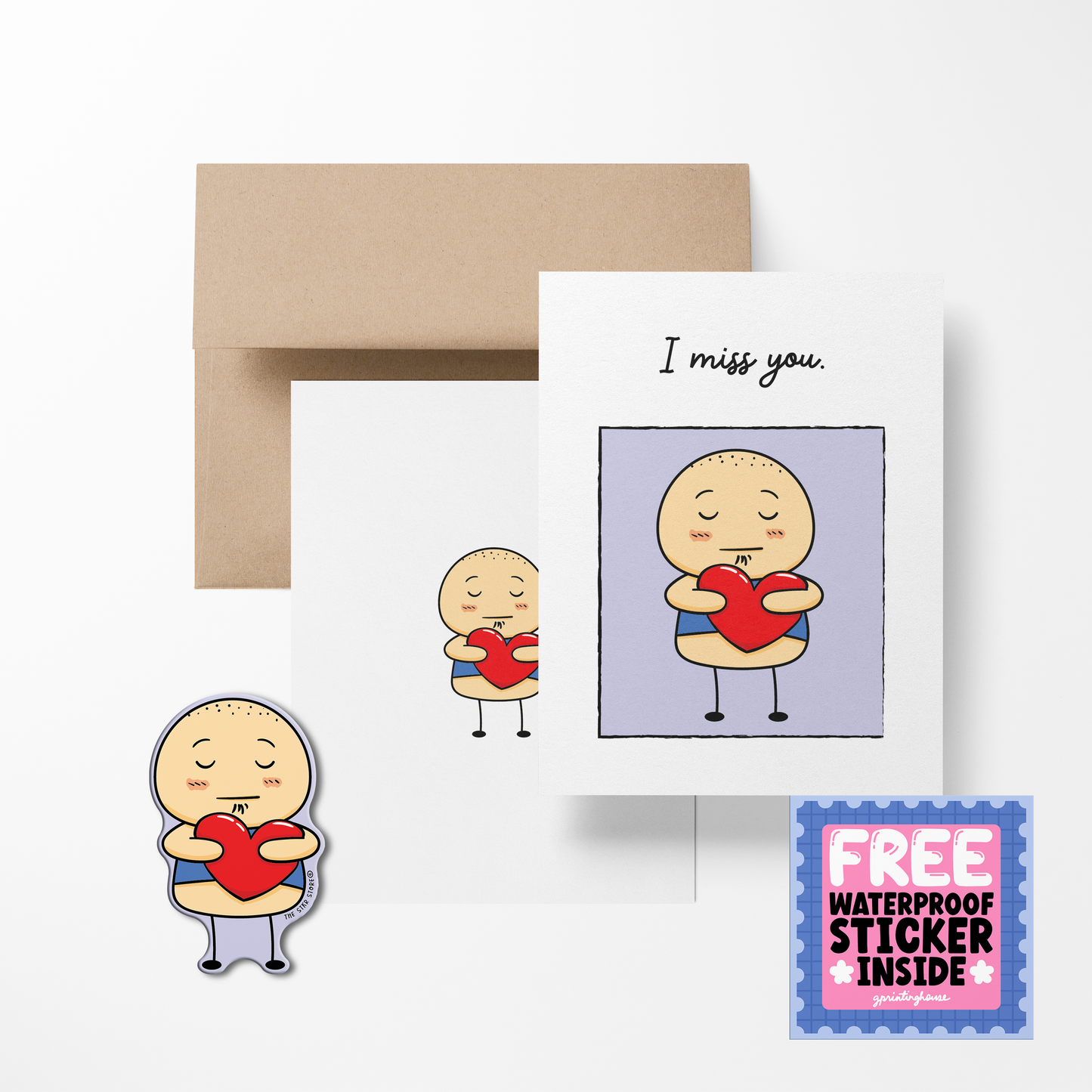A greeting card with a cartoon potato character holding a heart, with the text 'I miss you.' Accompanied by a brown kraft envelope and a free waterproof vinyl sticker.