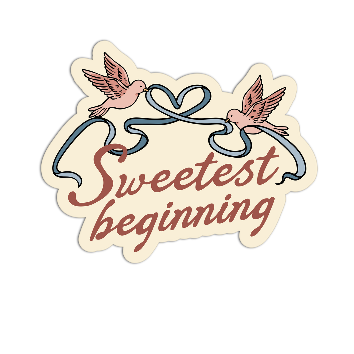 A die-cut sticker with the phrase 'Sweetest beginning' in cursive script, featuring two pink doves holding a blue ribbon that forms a heart at the top, on a cream background with a thin black outer border.