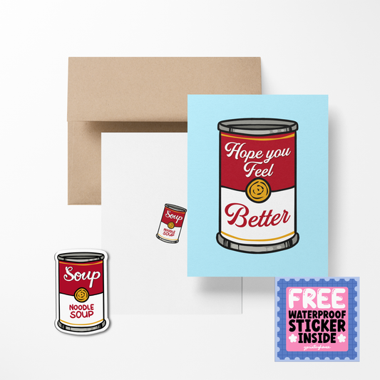 A greeting card with an illustration of a soup can, with the text 'Hope you feel better', accompanied by a brown envelope and a free waterproof vinyl sticker.