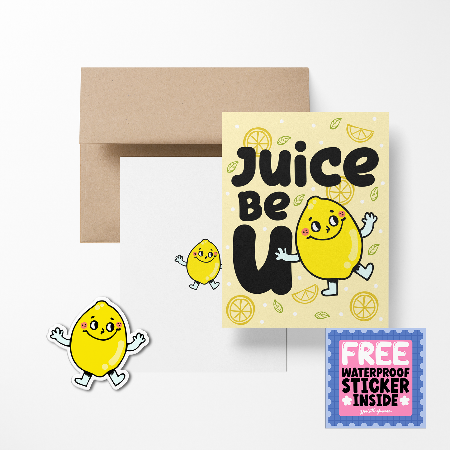 A greeting card with a cute lemon character design, titled 'Juice Be U', accompanied by a brown envelope and a free waterproof vinyl sticker.