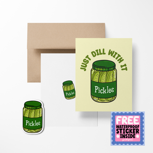 A greeting card with an illustration of a pickle jar, titled 'Just Dill With It', accompanied by a brown envelope and a free waterproof vinyl sticker.