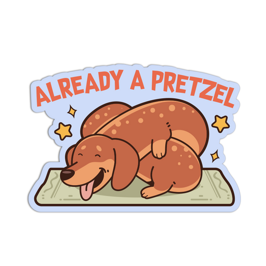 Sticker with a dog doing a pretzel and text 'ALREADY A PRETZEL' on a white background