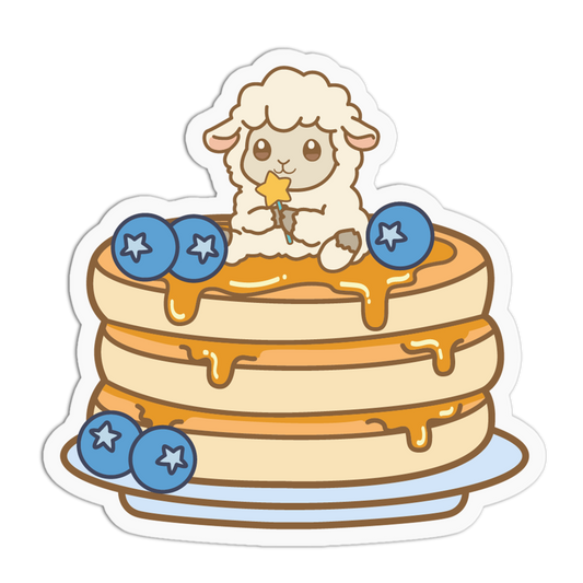 Cartoon sheep on a stack of pancakes with blueberries and syrup.