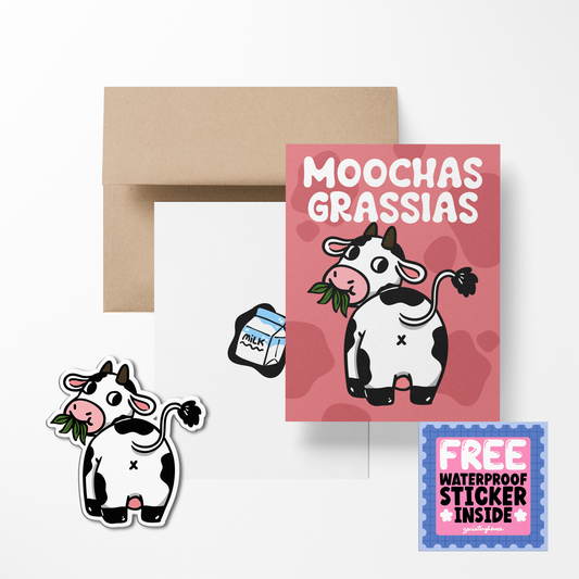 A greeting card with an illustration of a cow, accompanied by a free waterproof vinyl sticker, displayed with its envelope.