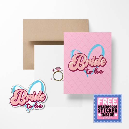 A pink greeting card with 'Bride to be' written on it, accompanied by a sticker with the same text and a ring illustration, all displayed on a white background.