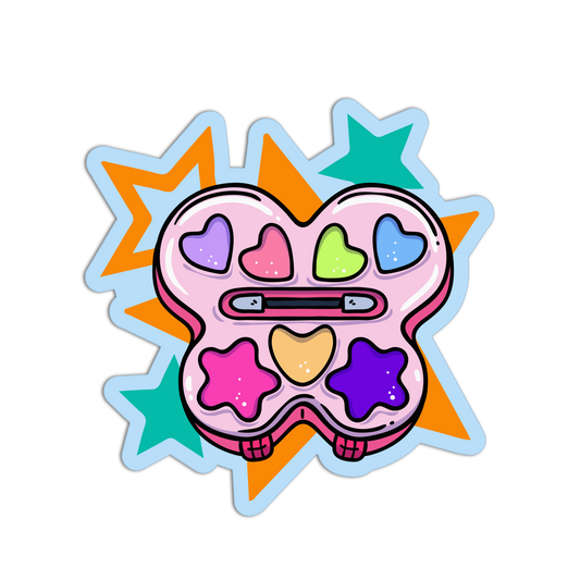 A die-cut sticker featuring a cartoon-style pastel makeup palette with six colorful pans and starburst accents in orange, teal, and pink on a white background.