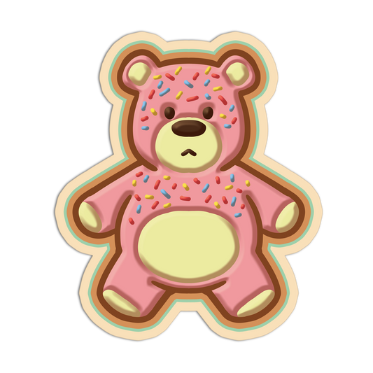 Sticker of a pink teddy bear with sprinkles on a white background