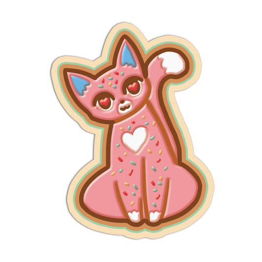 Cartoon cat-shaped cookie with pink body, blue ears, and colorful sprinkles on a white background