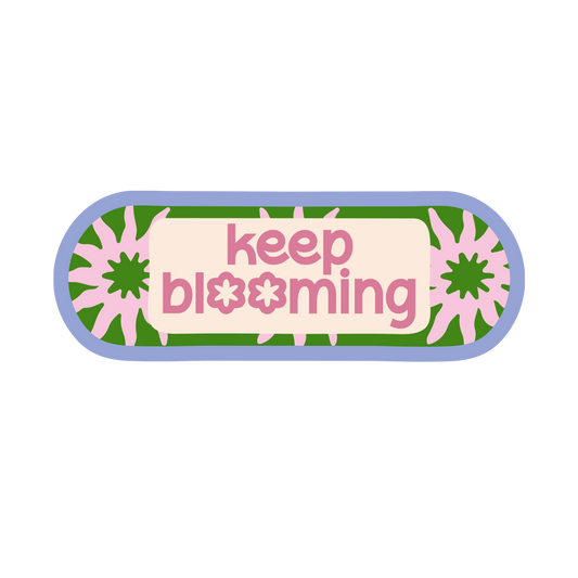 Rectangular patch with 'keep blooming' text and floral designs on a white background