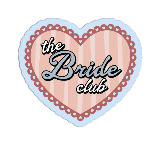 A heart-shaped sticker or decal with the words 'the Bride club' in stylized lettering. The center has pale pink and white vertical stripes, a dusty rose scalloped inner border, and a light blue outer border on a plain white background.