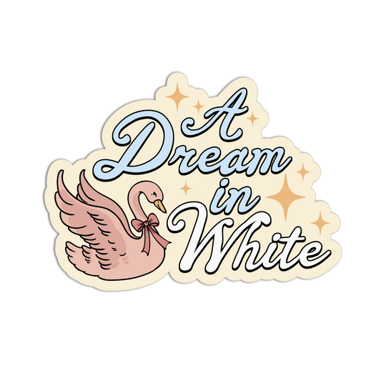 A die-cut sticker featuring the phrase 'A Dream in White' in stylized light blue and white lettering, accompanied by a pink swan wearing a bow and small gold star accents, shown on a plain white background.