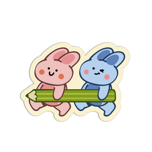A cartoon die-cut sticker showing two cute rabbits pushing a large green pencil. One rabbit is pink with pink ears and cheeks, and the other is blue with blue ears and cheeks.