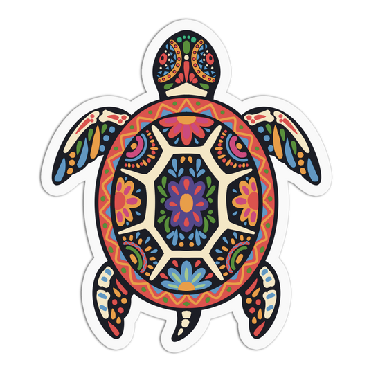 A die-cut sticker featuring a colorful, hand-painted style sea turtle with intricate geometric and floral patterns in red, orange, yellow, green, blue, purple, and black, shown on a plain white background.