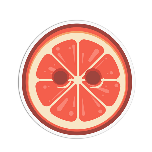 Circular sticker of a sliced grapefruit on a white background