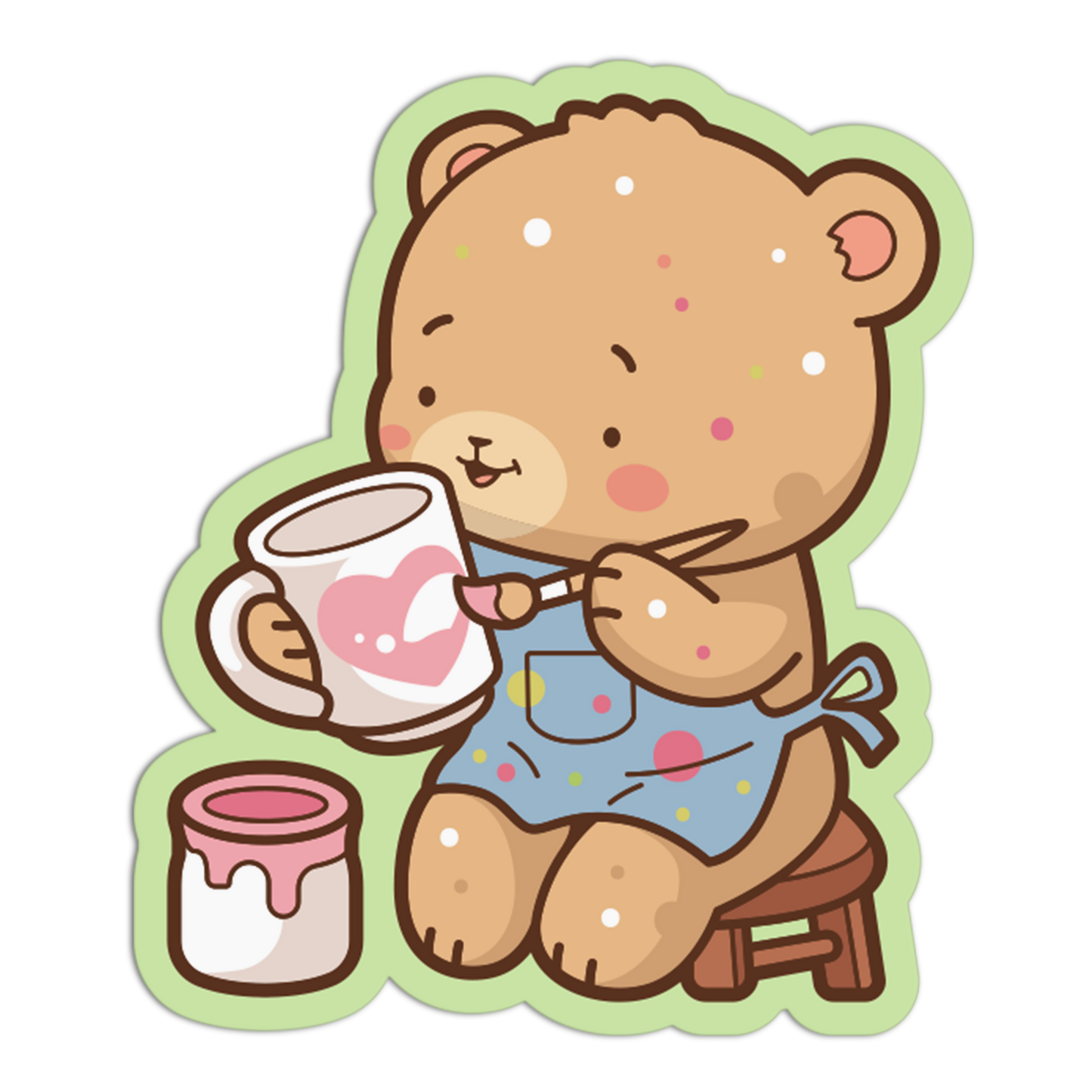 Cartoon bear painting a heart on a mug with a jar of paint and brush.