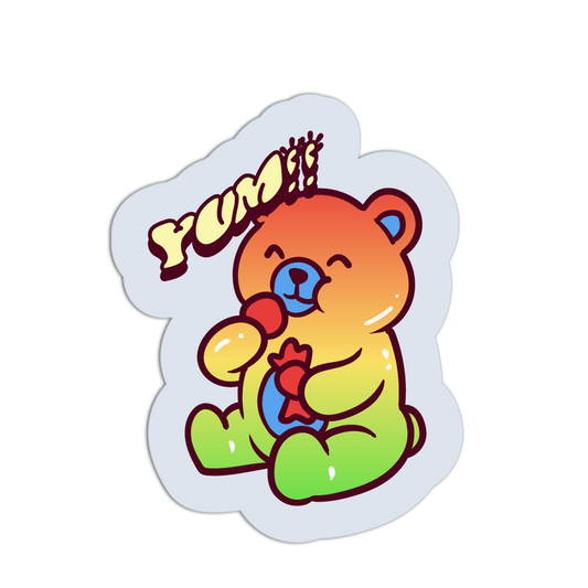 Colorful bear sticker with 'YUM' text on a white background