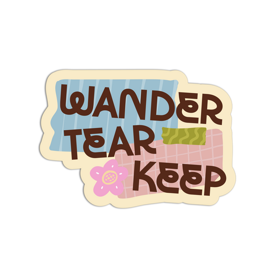 Sticker with 'Wander Tear Keep' text and decorative elements on a white background