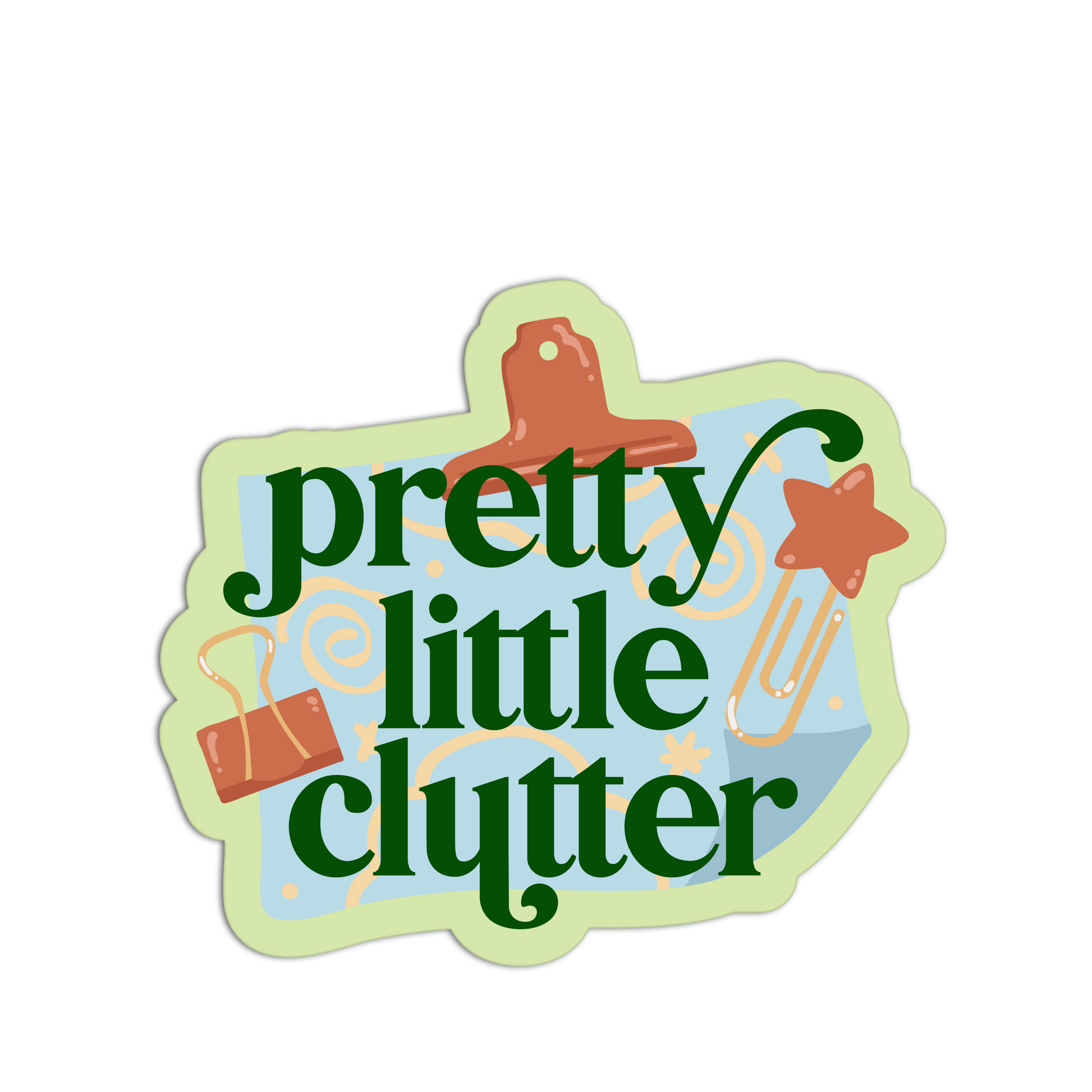 Decorative sign with 'pretty little clutter' text and office supplies on a white background