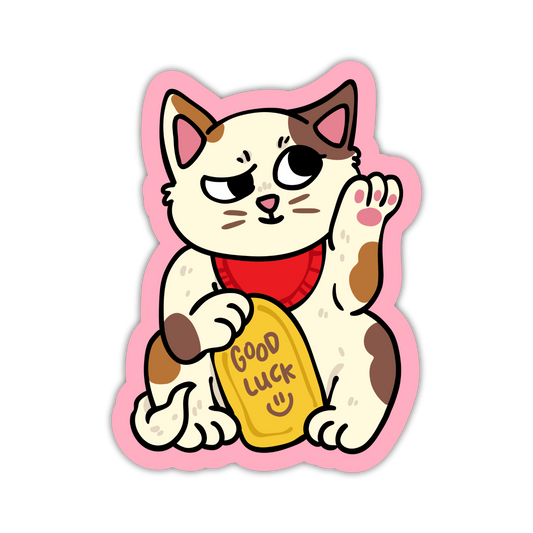 Cartoon cat holding a 'Good Luck' sign with a pink border on a white background