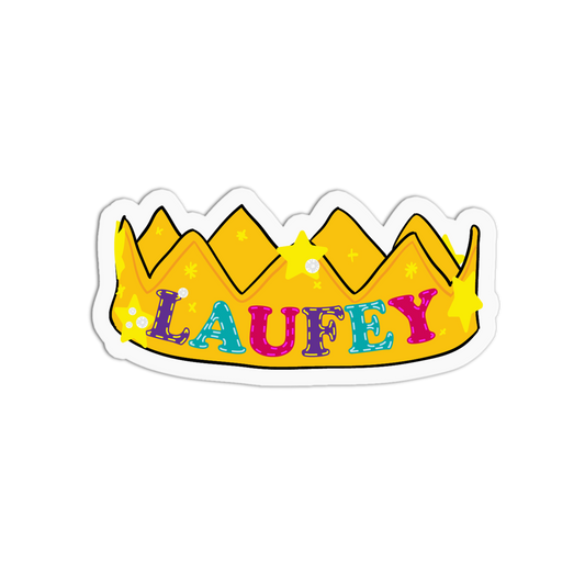 A die-cut sticker shaped like a yellow crown with the name 'LAUFETY' written across it in colorful glitter-style letters, shown on a plain white background.