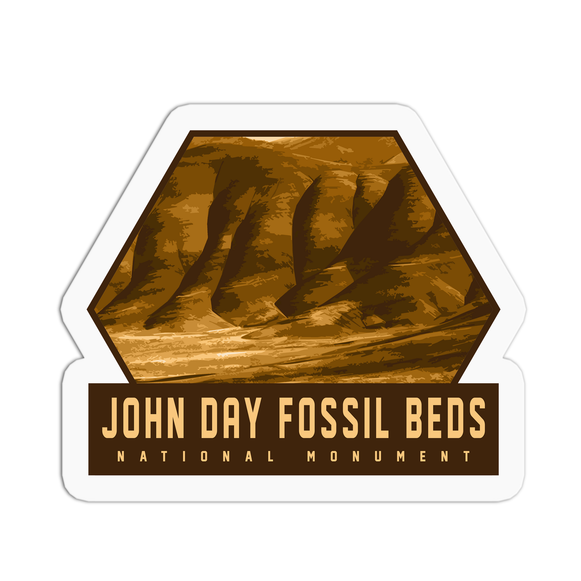 Sticker of John Day Fossil Beds National Monument with a brown hexagonal design on a white background.