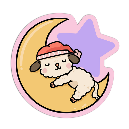 Cartoon dog in a Santa hat sleeping on a moon and star shape with a pink border.