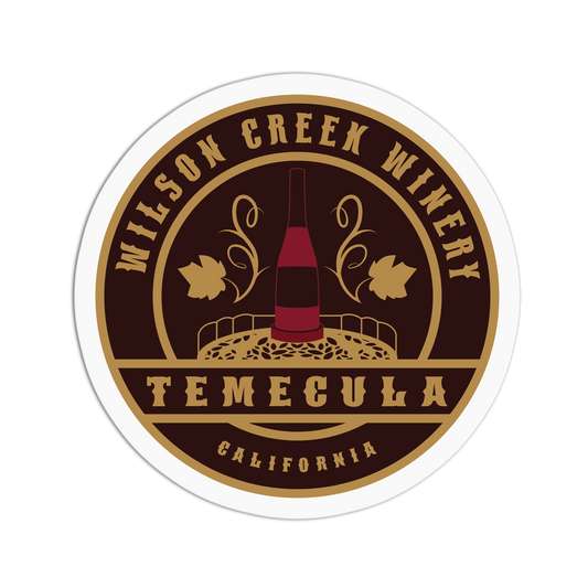 Wilson Creek Winery logo with a wine bottle and vineyard illustration on a brown background.